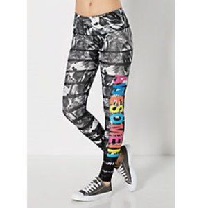 RUE21 workout leggings with floral pattern and horizontal stripes XS